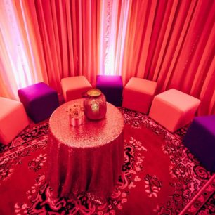 Purple, gold ottoman covers at Arabian nights event