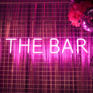 the bar pink neon sign 