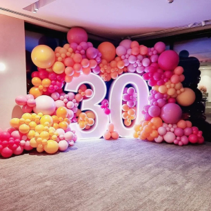 light up number 30 with pink balloon display