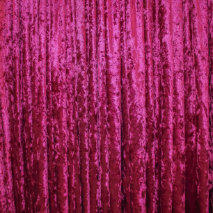 dark pink coloured crushed velvet drape
