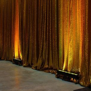 gold sequin drape gold colourband uplighting