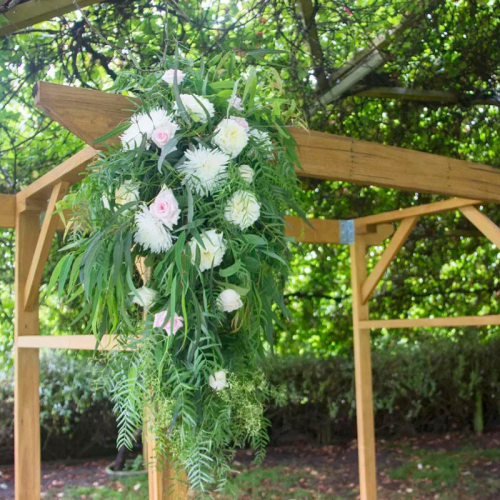 close up wooden wedding arch 