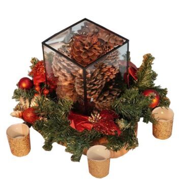 table christmas centrepiece with pinecones and candles