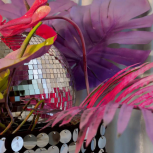 close up look at table centrepiece neon disco