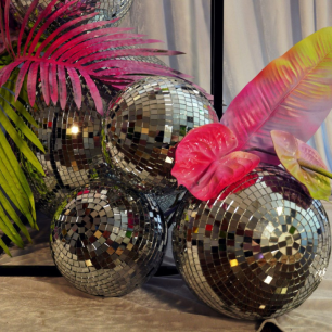 mirror balls with sprayed neon leaves