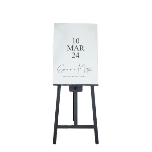 black easel with welcome wedding sign