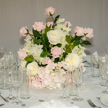 floral centrepiece on wedding table