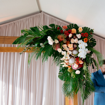 tropical florals corner of wooden arbour