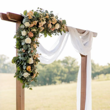 wedding ceremony arch with subtle florals 