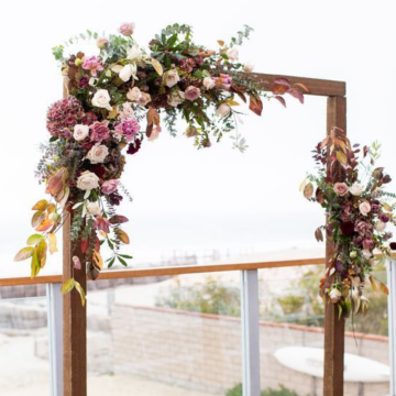 rustic wedding ceremony arch with subtle florals 