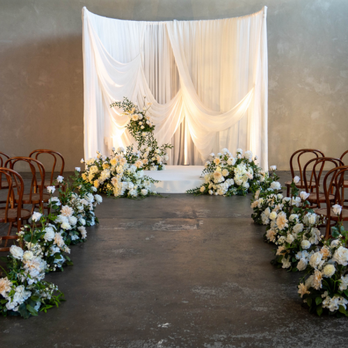 full white floral aisle