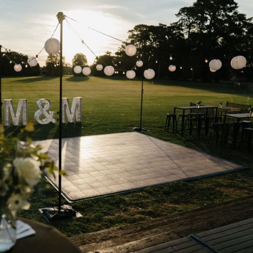 festoon lights over outdoor dancefloor