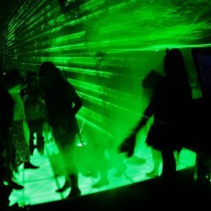 haze machine smoke across dancefloor green lighting