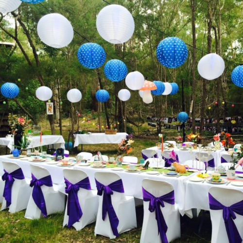 purple satin chair sashes outside dinning 