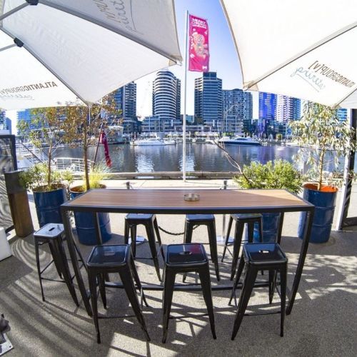 Black Stools Around Table Outside Restaurant Venue